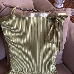 Light green top. Cute ribbon bow. Layered soft material with spaghetti straps.